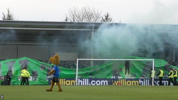 Smoke bombs are thrown at Stair Park