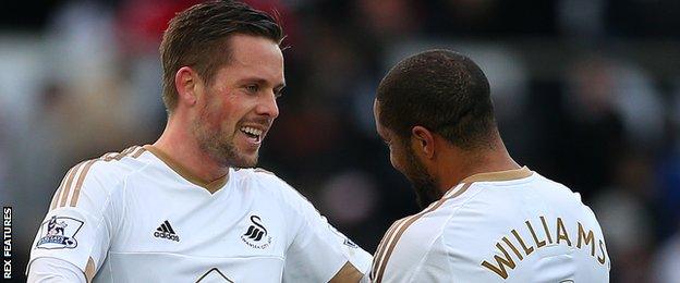 Gylfi Sigurdsson and Ashley Williams