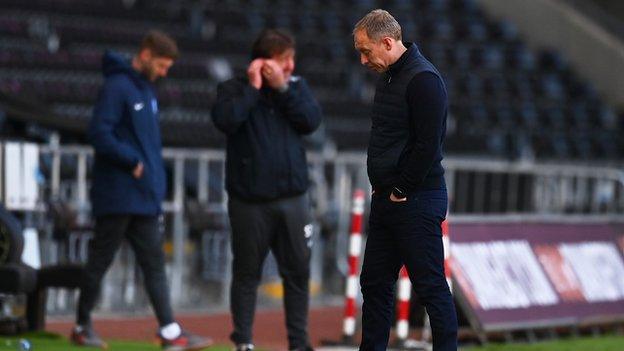 Dejected Steve Cooper after Swansea's defeat against Preston