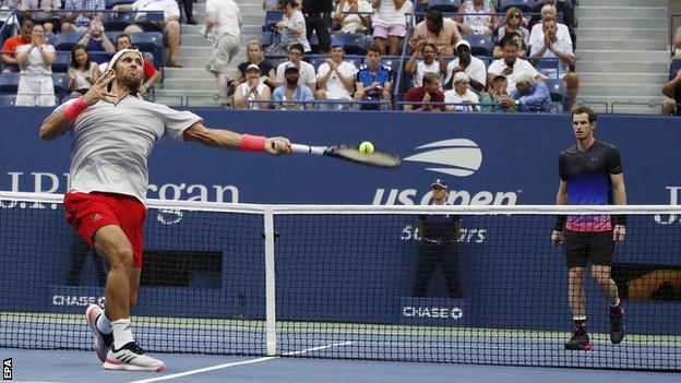 Fernando Verdasco celebrates after defeating Andy Murray