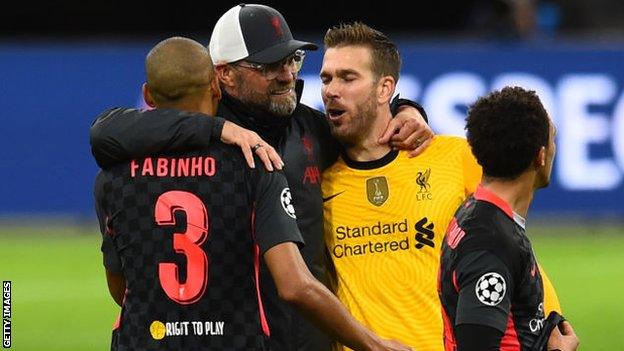 Jurgen Klopp celebrating with Adrian and Fabinho