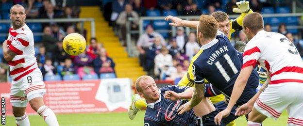 Craig Curran knocks in the first of his two goals at Victoria Park