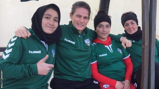 Kelly Lindsey with Afghanistan players