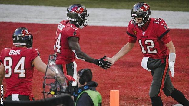 Tom Brady of the Tampa Bay Buccaneers celebrates a touchdown