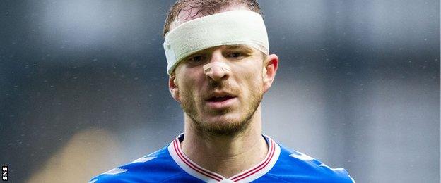 Rangers' Andy Halliday was heavily bandaged after falling over an advertising board