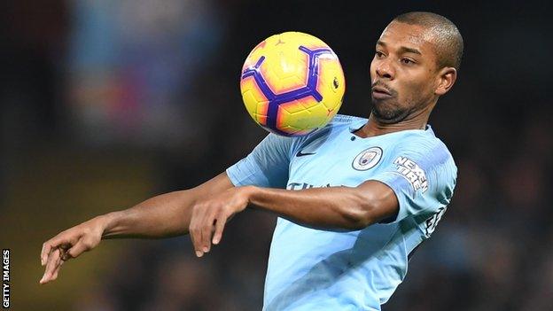 Fernandinho in action for Manchester City against Liverpool