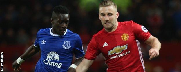 Idrissa Gueye of Everton and Luke Shaw of Manchester United