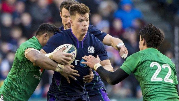 Scotland centre Huw Jones in action against Ireland