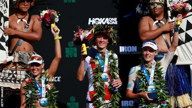 Lucy Charles-Barclay on the 2017 Ironman World Championships podium alongside Daniela Ryf and Sarah Crowley