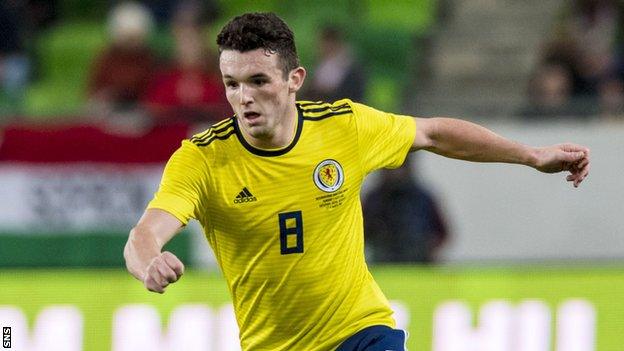 John McGinn in action for Scotland