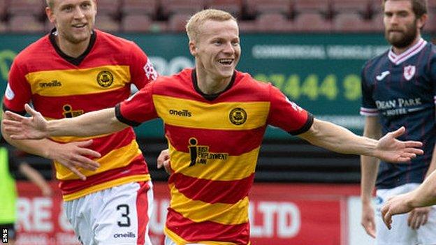 Partick Thistle's Scott Tiffoney celebrates after scoring to make it 1-0