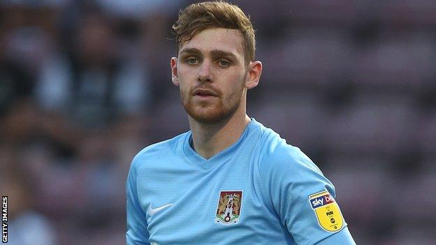 Andrew Fisher in action for Northampton Town