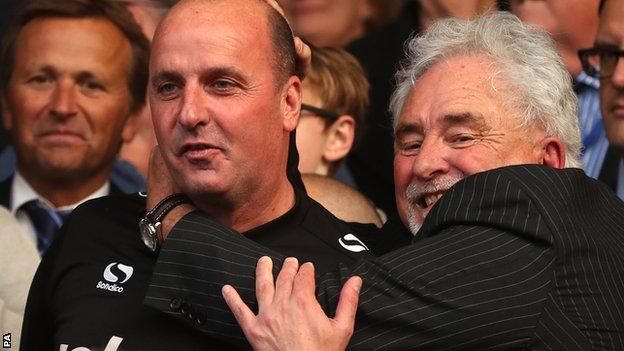 Portsmouth manager Paul Cook with departing chairman Ian McInnes