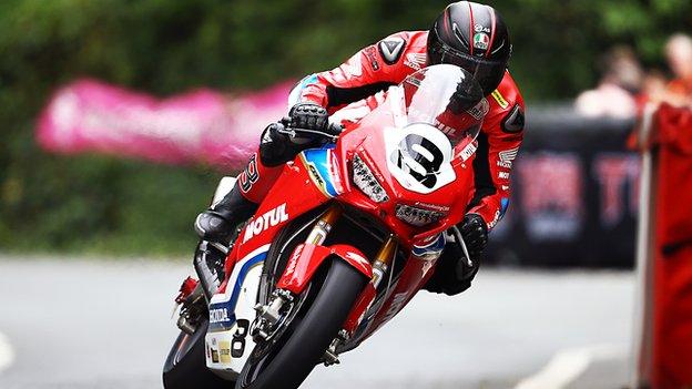 Guy Martin crashed out of the opening Superbike race at the TT races