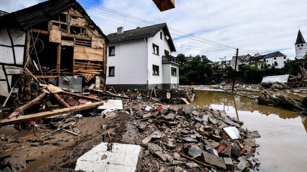 Houses damaged by the flood water