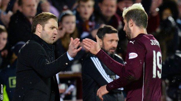 Robbie Neilson congratulates Spanish striker Juanma