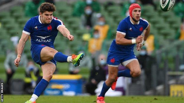 France's Matthieu Jalibert kicks the ball