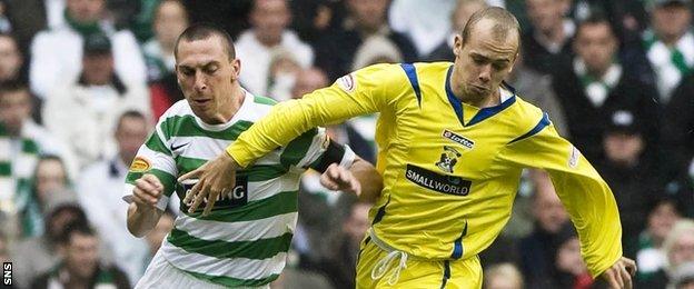 Scott Brown tussles for possession with Kilmarnock's Jamie Hamill