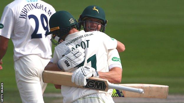 Chris Read and Billy Root embrace