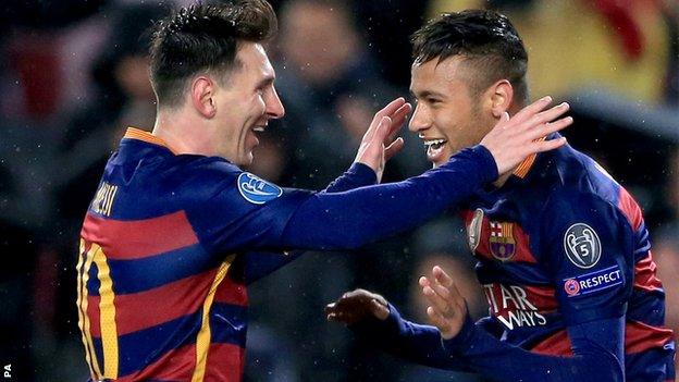 Lionel Messi and Neymar celebrate a goal for Barcelona