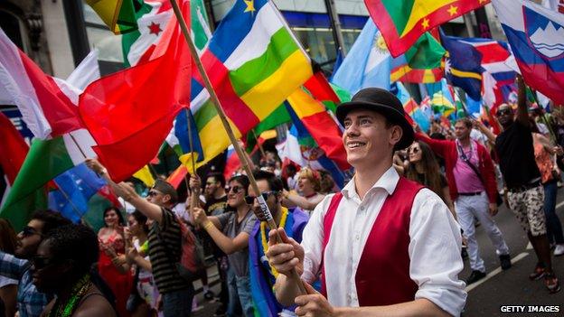 Members of the Lesbian, Gay, Bisexual and Transgender (LGBT) community take part in the Pride Parade in London