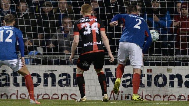 Mark Stafford pulls one back for Linfield but Crusaders prevailed in north Belfast