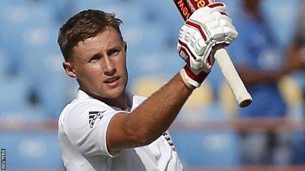 Joe Root celebrates reaching his century in the first Test against India