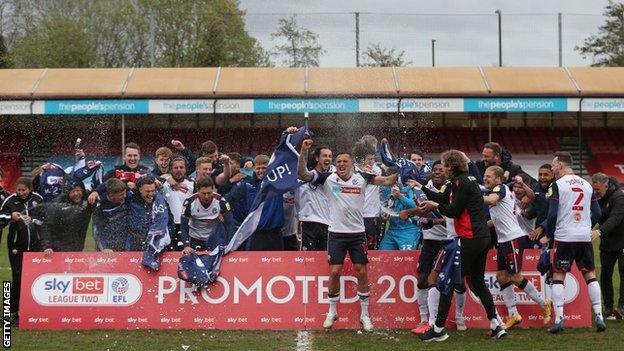 Bolton players and staff celebrate