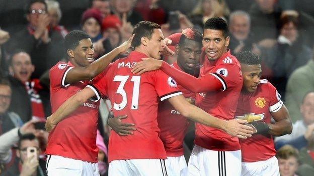 Manchester United players celebrate