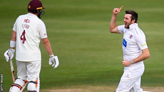 Craig Overton celebrates