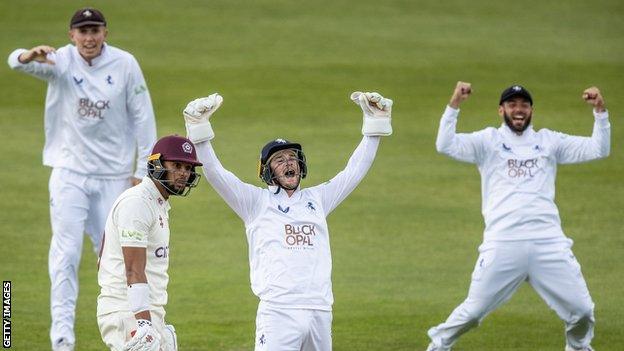 Kent wicketkeeper Ollie Robinson celebrates the lbw dismissal of Emilio Gay