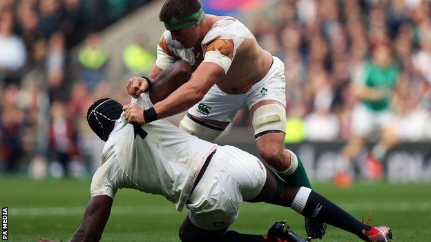 Maro Itoje and CJ Stander tussle