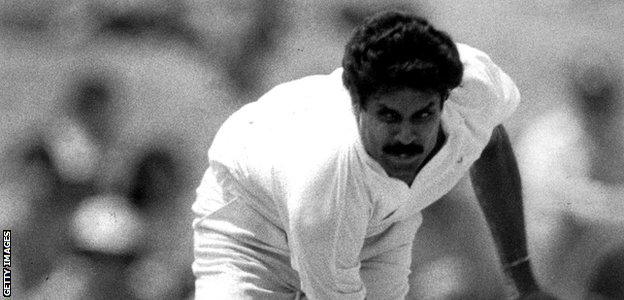 Kapil Dev bowls