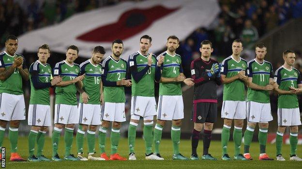 Northern Ireland players wore plain black armbands