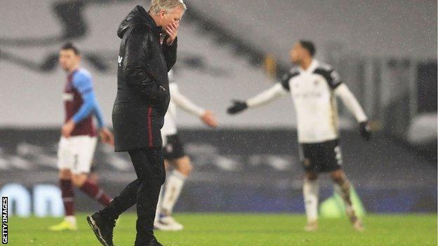 David Moyes walks off the pitch after West Ham's draw with Fulham