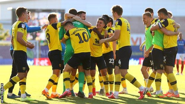 Oxford players celebrate