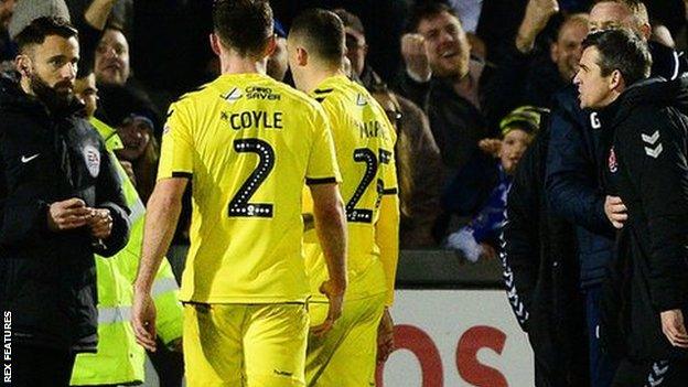 Fleetwood boss Joey Barton (right) was sent off late on in their defeat by Bristol Rovers