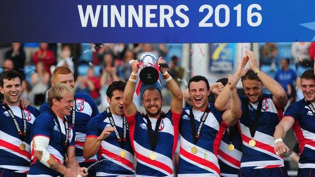 Captain Luke Treharne lifts the trophy after the Royals' win over France