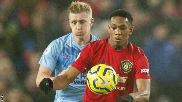 Burnley's Ben Mee and Manchester United's Anthony Martial