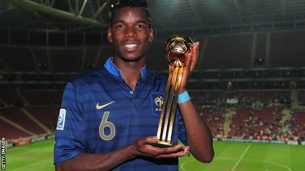 Pogba with his Golden Ball award after helping France win the FIFA U-20 World Cup in 2013