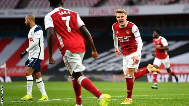 Martin Odegaard celebrates scoring against Tottenham