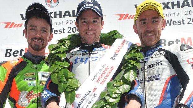 Glenn Iwrin (left) on the NW 200 Supersport podium with winner Alastair Seeley and Lee Johnston in 2015