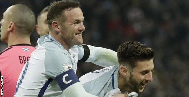 Lallana and Rooney celebrate