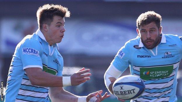 Huw Jones sends out a pass for Glasgow