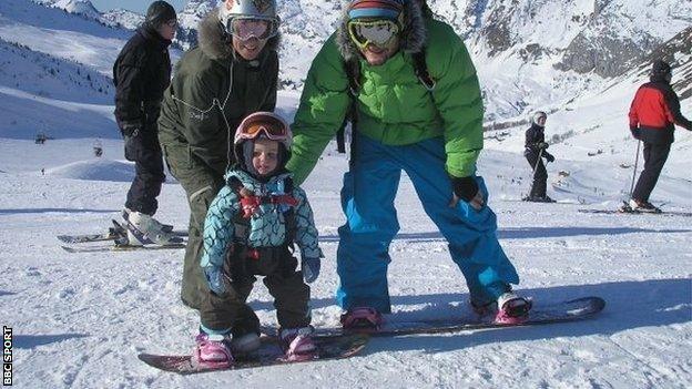 Mia Brookes aged 22 months old on a snowboard