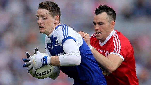 Tyrone's Cathal McCarron tackles Monaghan's Conor McManus in the 2013 All-Ireland quarter-final