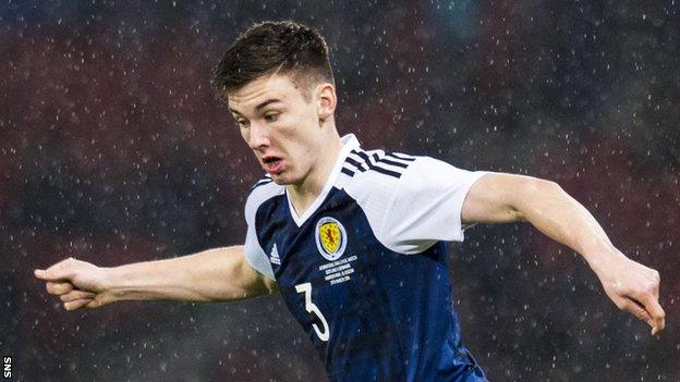 Kieran Tierney in action for Scotland against Denmark