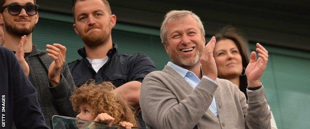 Roman Abramovich (right)