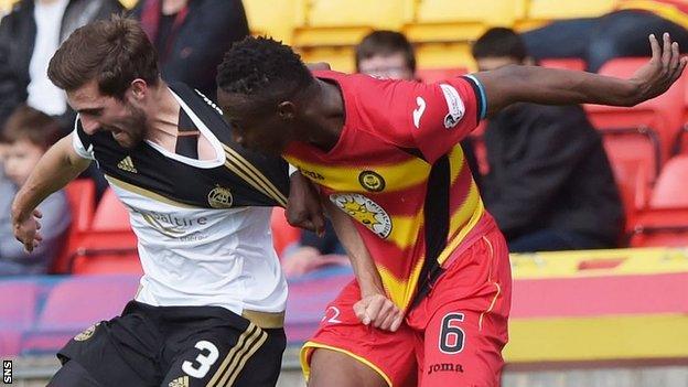 Graeme Shinnie and Abdul Osman