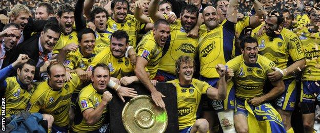 Clermont Auvergne players celebrate winning the Top 14 final in 2010